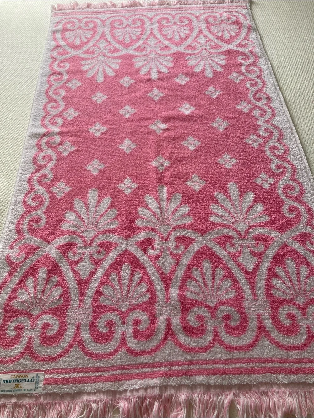 Pink and white vintage Cannon towel with fringe